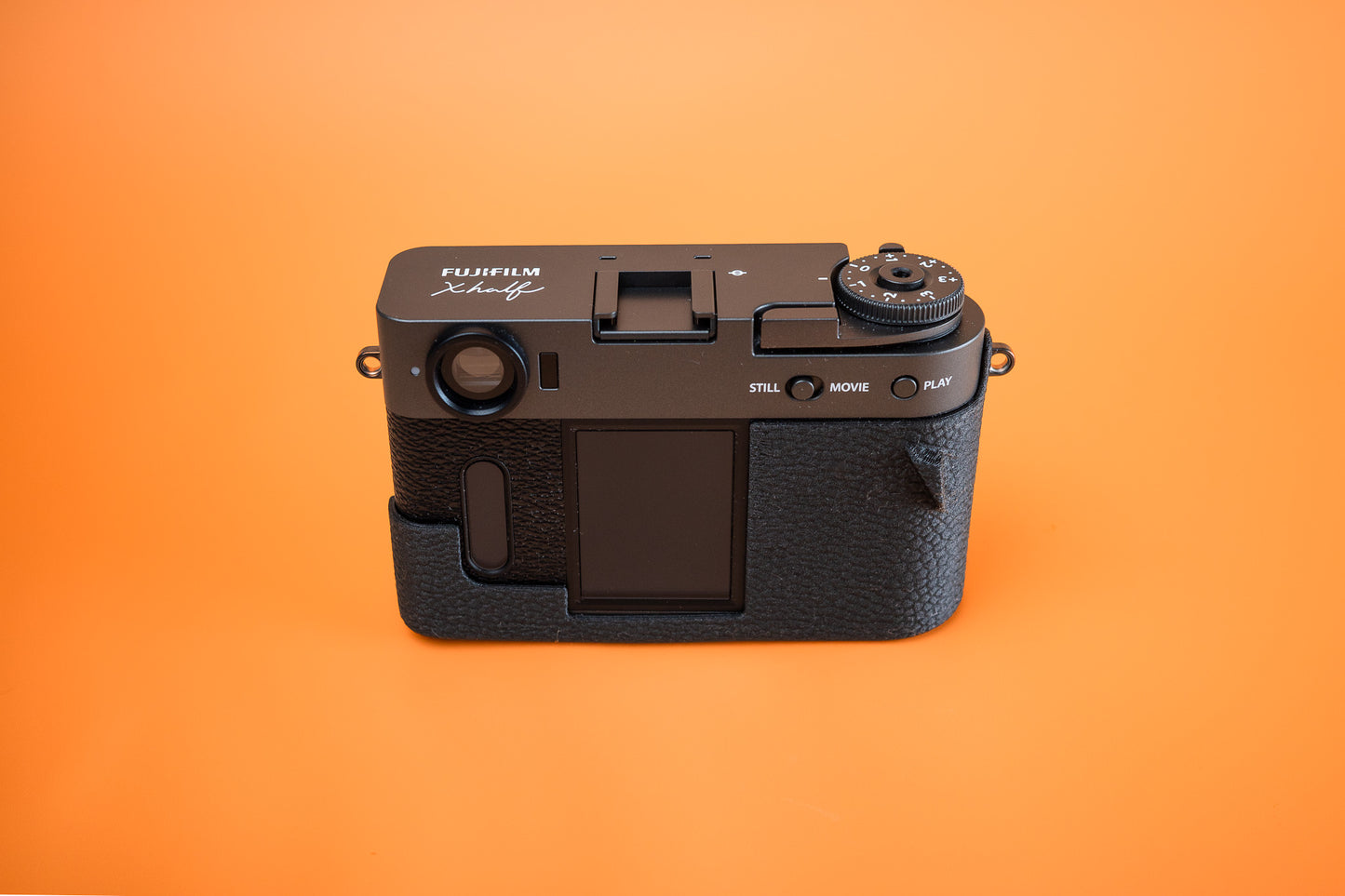 Fujifilm X half Slim Skin Case, rear view showing screen and control cutouts