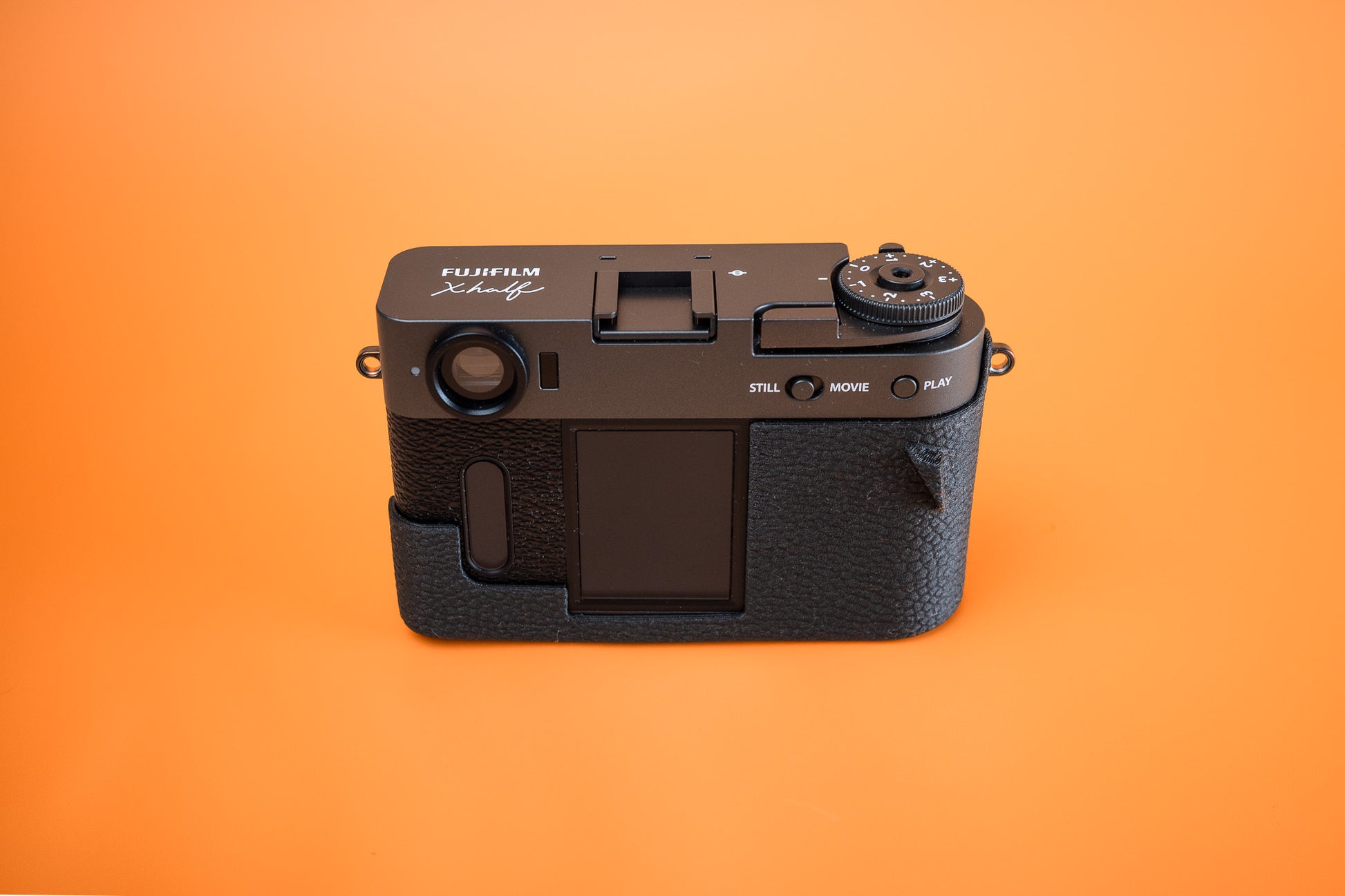 Fujifilm X half Slim Skin Case, rear view showing screen and control cutouts