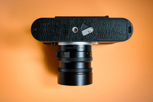 Leica M11 black vinyl leatherette-style base protector.